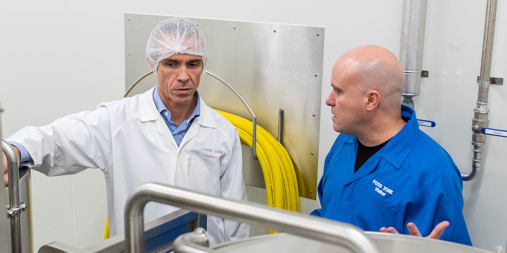 Owner of Rockstar Brewer Academy Steve Hendo Henderson talking to Senior Food Scientist Andrew Forrest