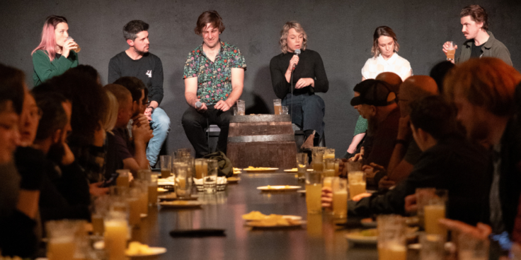 People on a stage at a Science Made Beerable event